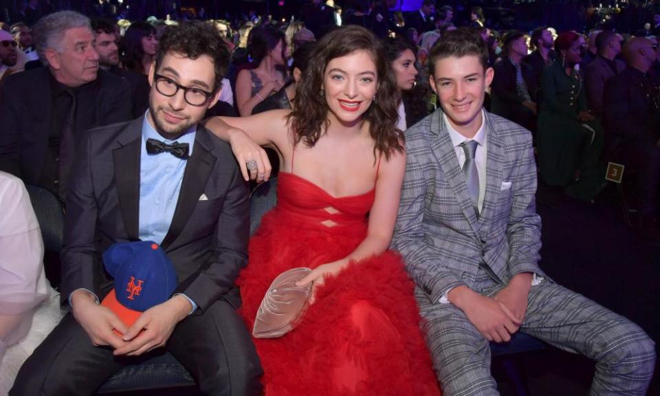 Lorde at the 2018 Grammys with Melodrama co-producer Jack Antonoff, left, and her brother Angelo.