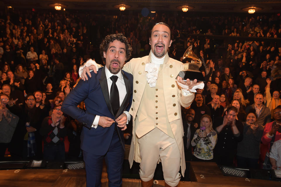 NEW YORK, NY - FEBRUARY 15:  Music director Alex Lacamoire and Actor, composer Lin-Manuel Miranda celebrate on stage during 'Hamilton' GRAMMY performance for The 58th GRAMMY Awards at Richard Rodgers Theater on February 15, 2016 in New York City.  (Photo by Theo Wargo/Getty Images)