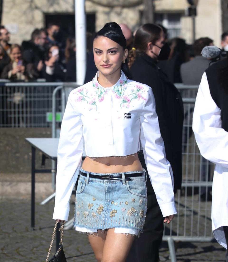 Camila Mendes arrives at the Miu Miu fashion show in Paris on March 8, 2022.