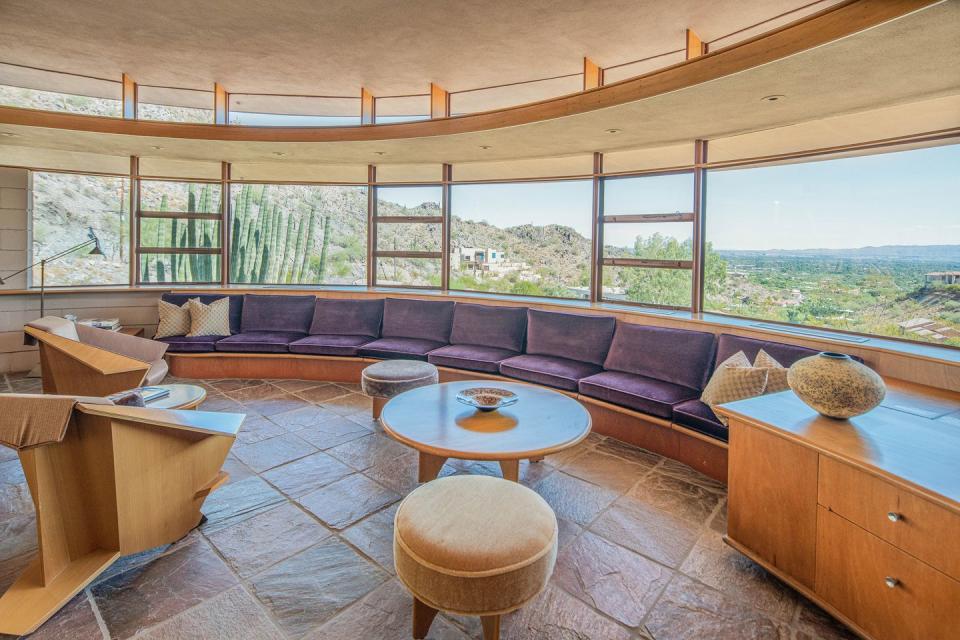 4) The curved living room offers a gorgeous view of the city.