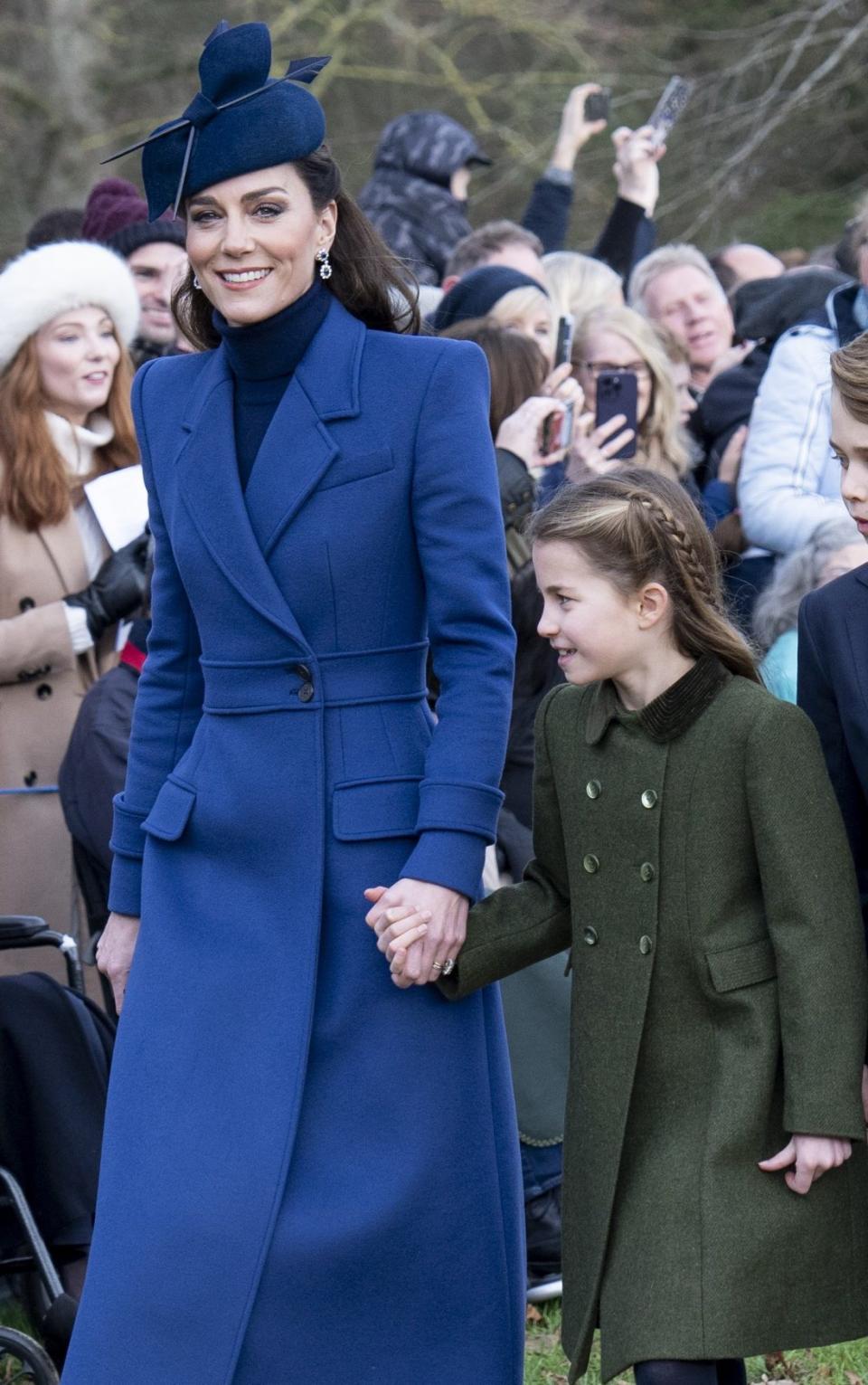 The Princess of Wales and Princess Charlotte arriving hand-in-hand at Sandringham