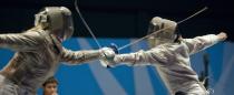 Mariel Zagunis (L) of the USA competes against Angelica Larios of Mexico in a team's sabre gold medal match, during the Guadalajara 2011 Pan American Games, in Guadalajara, Mexico, on October 28, 2011. AFP PHOTO/OMAR TORRES (Photo credit should read OMAR TORRES/AFP/Getty Images)