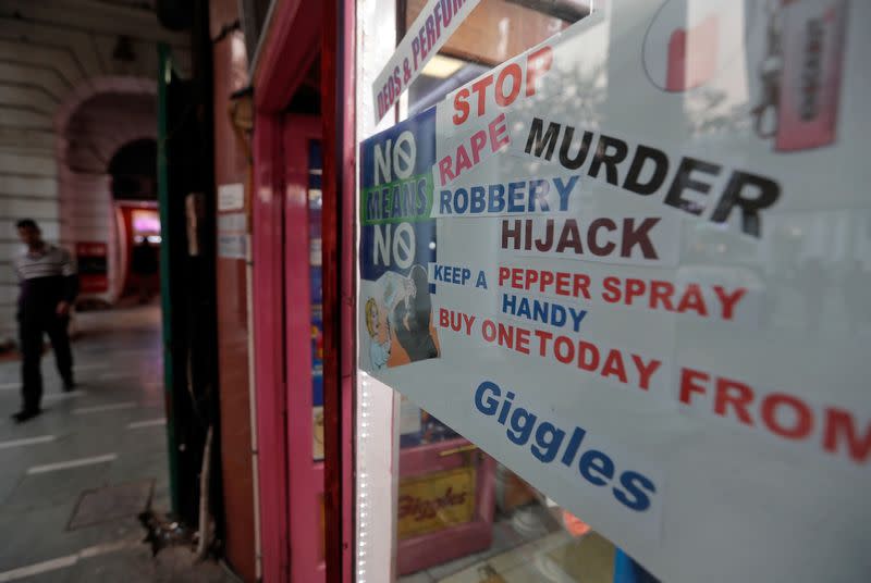 An advertisement poster of a shop selling pepper spray is pictured in New Delhi