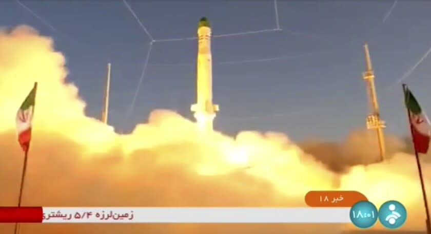 In this frame grab from video footage released Sunday, June 26, 2022 by Iran state TV, IRINN, shows an Iranian satellite-carrier rocket, called "Zuljanah," blasting off from an undisclosed location in Iran. State TV on Sunday aired the launch of the solid-fueled rocket, which drew a rebuke from Washington ahead of the expected resumption of stalled talks over Tehran's tattered nuclear deal with world powers. (IRINN via AP)