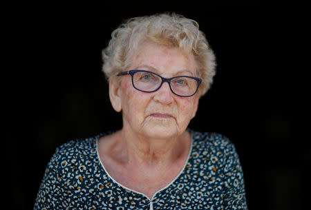 Marthe Rigault, 87 años, de Graignes, en la región de Normandía, posa para asistir a una entrevista con Reuters en Graignes, Francia, el 15 de mayo de 2019. REUTERS/Christian Hartmann/Files