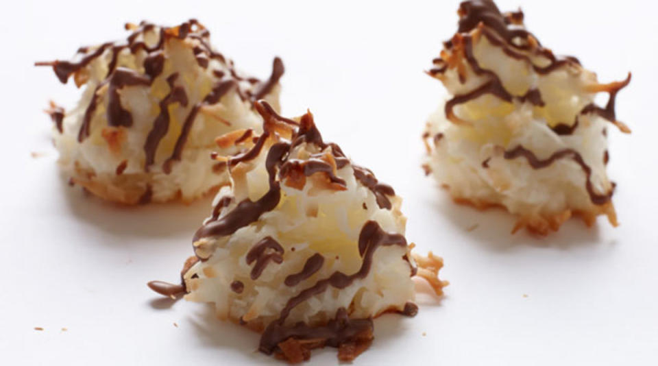 <p>Con Poulous</p><p>These delicious macaroons are sure to impress your guests. They look both festive and elegant, thanks to the chocolate glaze, but they’re actually quite simple to make. To store, wrap tightly and keep in the refrigerator or freezer.</p><p><strong>Get the recipe: <a href="https://parade.com/28543/dash/coconut-macaroons/" rel="nofollow noopener" target="_blank" data-ylk="slk:Coconut Macaroons;elm:context_link;itc:0;sec:content-canvas" class="link ">Coconut Macaroons</a></strong></p>