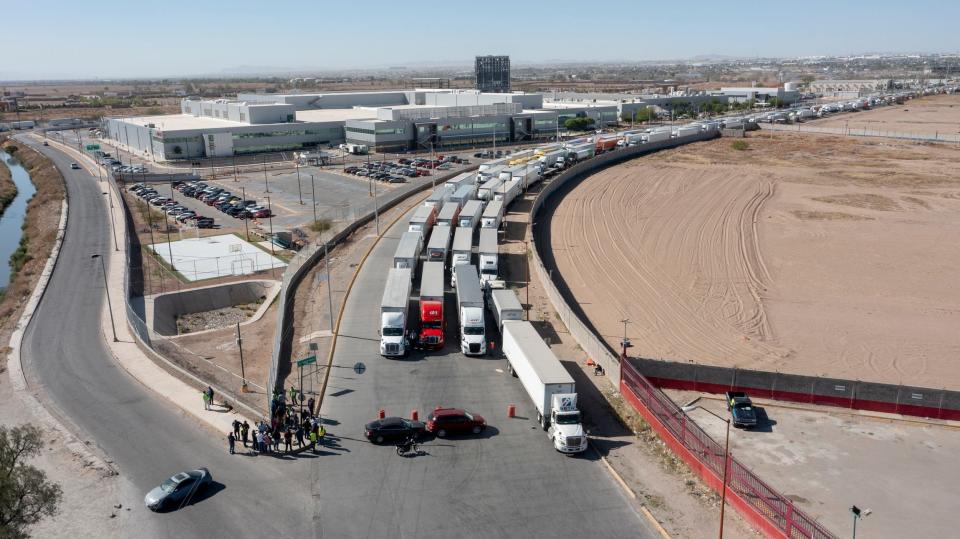 A long line of trucks sits stalled at the Zaragoza International Bridge from Ciudad Juarez to El Paso on Tuesday.