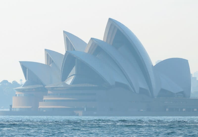 Smoke from bushfires shrouds the Sydney Opera House in Sydney