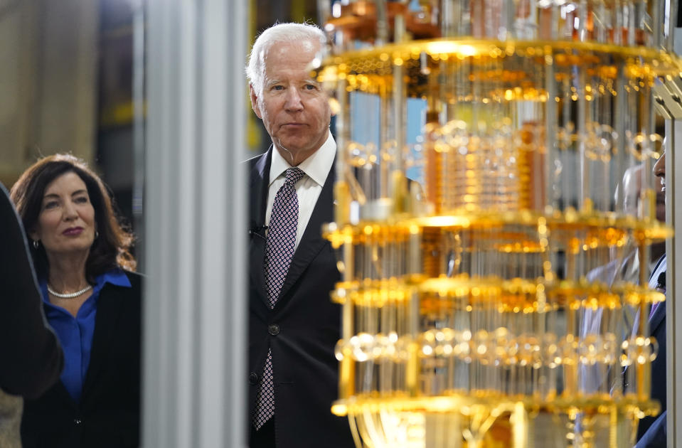 President Joe Biden looks at the IBM System One quantum computer with New York Gov. Kathy Hochul during a tour of an IBM facility in Poughkeepsie, N.Y., on Thursday Oct. 6, 2022. (AP Photo/Andrew Harnik)