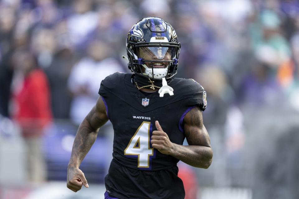 Baltimore Ravens wide receiver Zay Flowers (4) reacts as he takes the field prior to an NFL football game between the Baltimore Ravens and the Miami Dolphins, Sunday, Dec. 31, 2023 in Baltimore. (Michael Owens via AP)