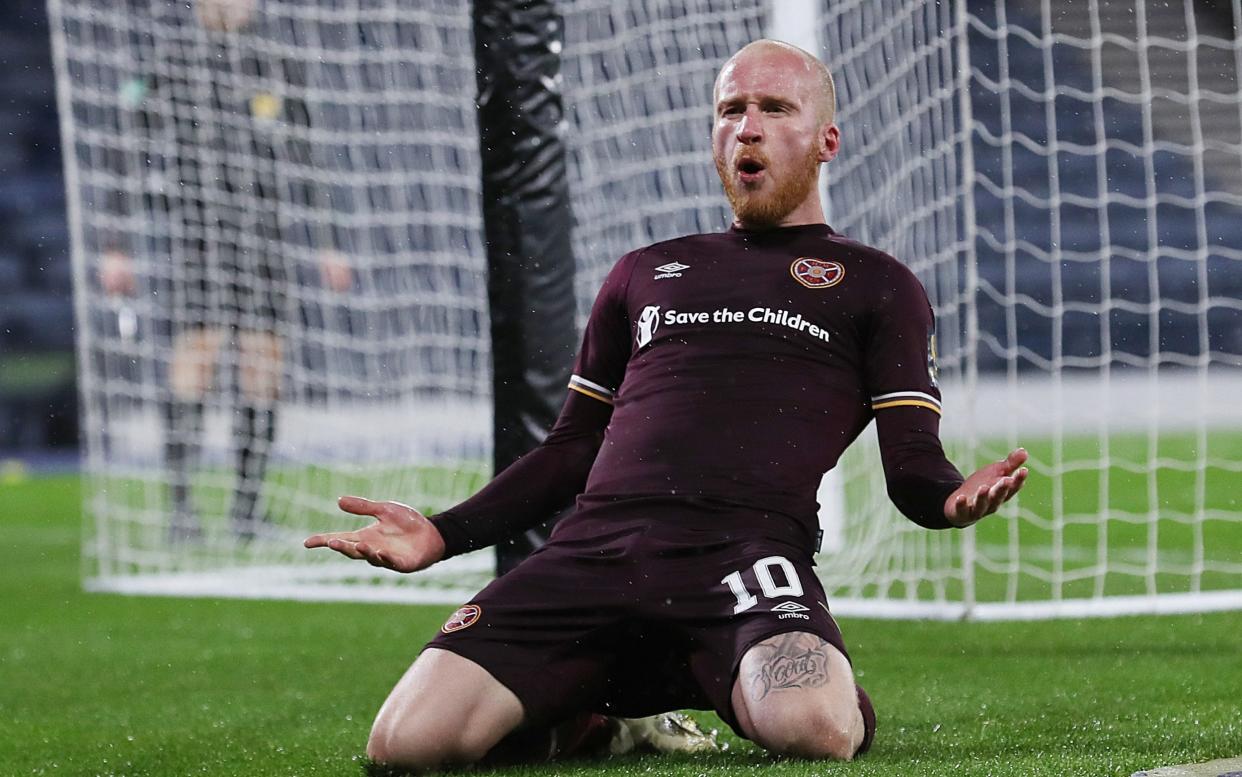  Liam Boyce of Heart of Midlothian celebrates after scoring his team's second goal from the penalty spot during the William Hill Scottish Cup first semi-final  - Getty Images