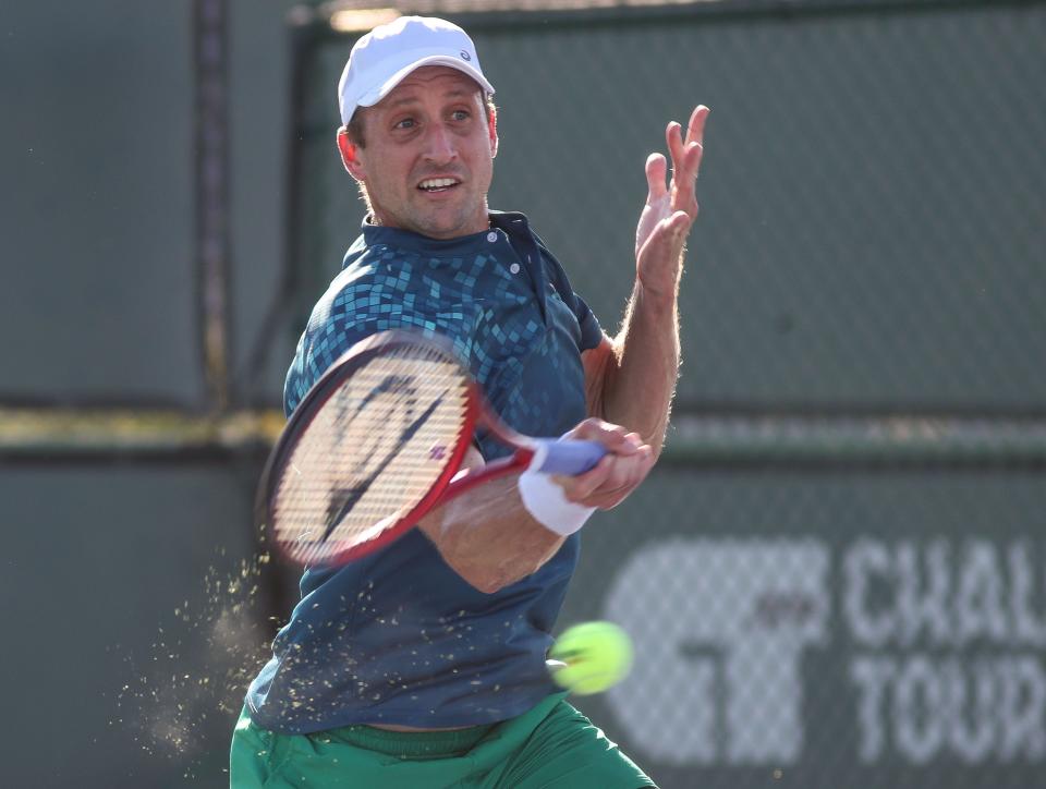 Tennys Sandgren hits a shot during his match against Trevor Svajda during the USTA Southern California Open at the Indian Wells Tennis Garden, Jan. 23, 2024.