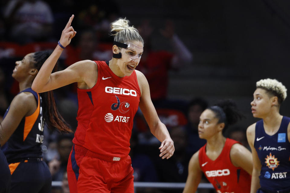 Washington Mystics forward Elena Delle Donne reacts after being fouled while scoring in the first half of Game 1 of basketball's WNBA Finals against the Connecticut Sun, Sunday, Sept. 29, 2019, in Washington. (AP Photo/Patrick Semansky)
