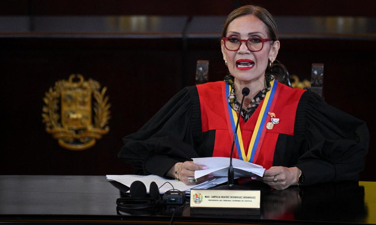 <span>The supreme court president, Caryslia Beatriz Rodríguez Rodríguez, declared Maduro’s re-election ‘indisputable’.</span><span>Photograph: Federico Parra/AFP/Getty Images</span>