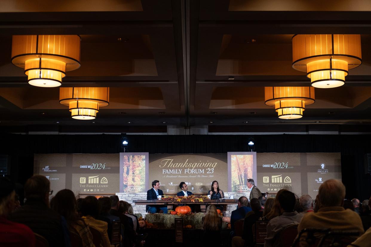 Republican presidential candidates Florida Gov. Ron DeSantis, entrepreneur Vivek Ramaswamy and former U.S. Ambassador Nikki Haley sit with Bob Vander Plaats, at the Thanksgiving Family Forum on Nov. 17, 2023, in Des Moines, Iowa.