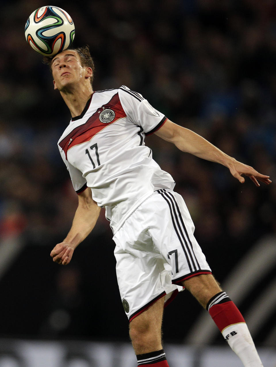 Germany's Leon Goretzka goes for a header during a friendly soccer match between Germany and Poland in Hamburg, Germany, Tuesday, May 13, 2014. (AP Photo/Michael Sohn)