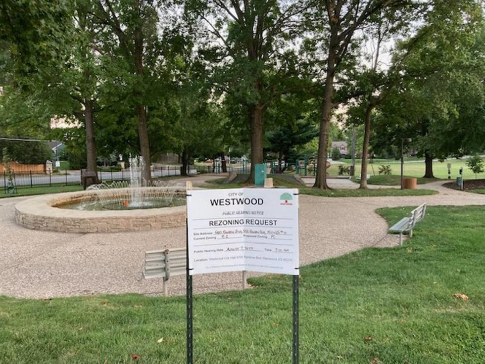 A sign at Joe. D. Dennis Park at 50th Street and Rainbow Boulevard in Westwood, announces an Aug. 7 public hearing to consider rezoning of the park and adjacent acres for a proposed office and retail development. The next meeting will be Sept. 11.