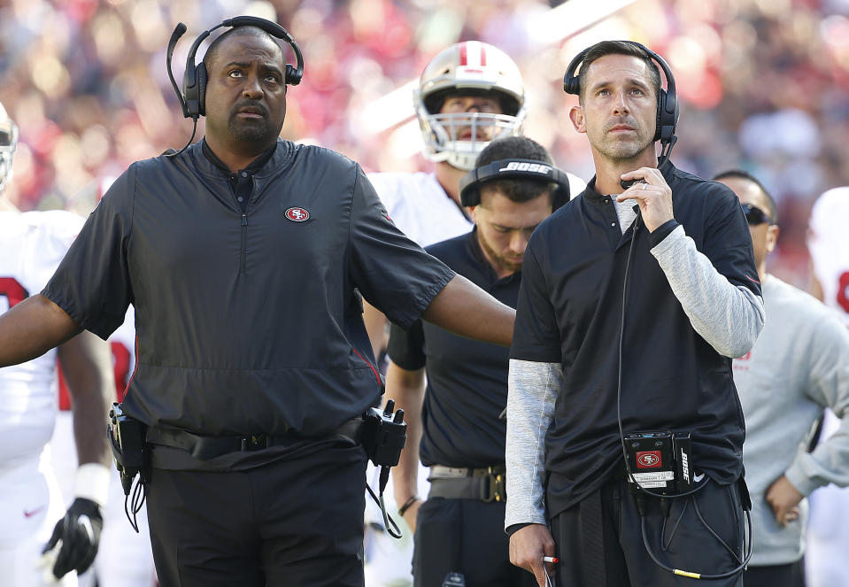 San Francisco 49ers head coach Kyle Shanahan, right, watches from the sideline with assistant coach Jon Embree during the first half of an NFL football game against the Los Angeles Rams in Santa Clara, Calif., Sunday, Oct. 21, 2018. (AP Photo/Josie Lepe)