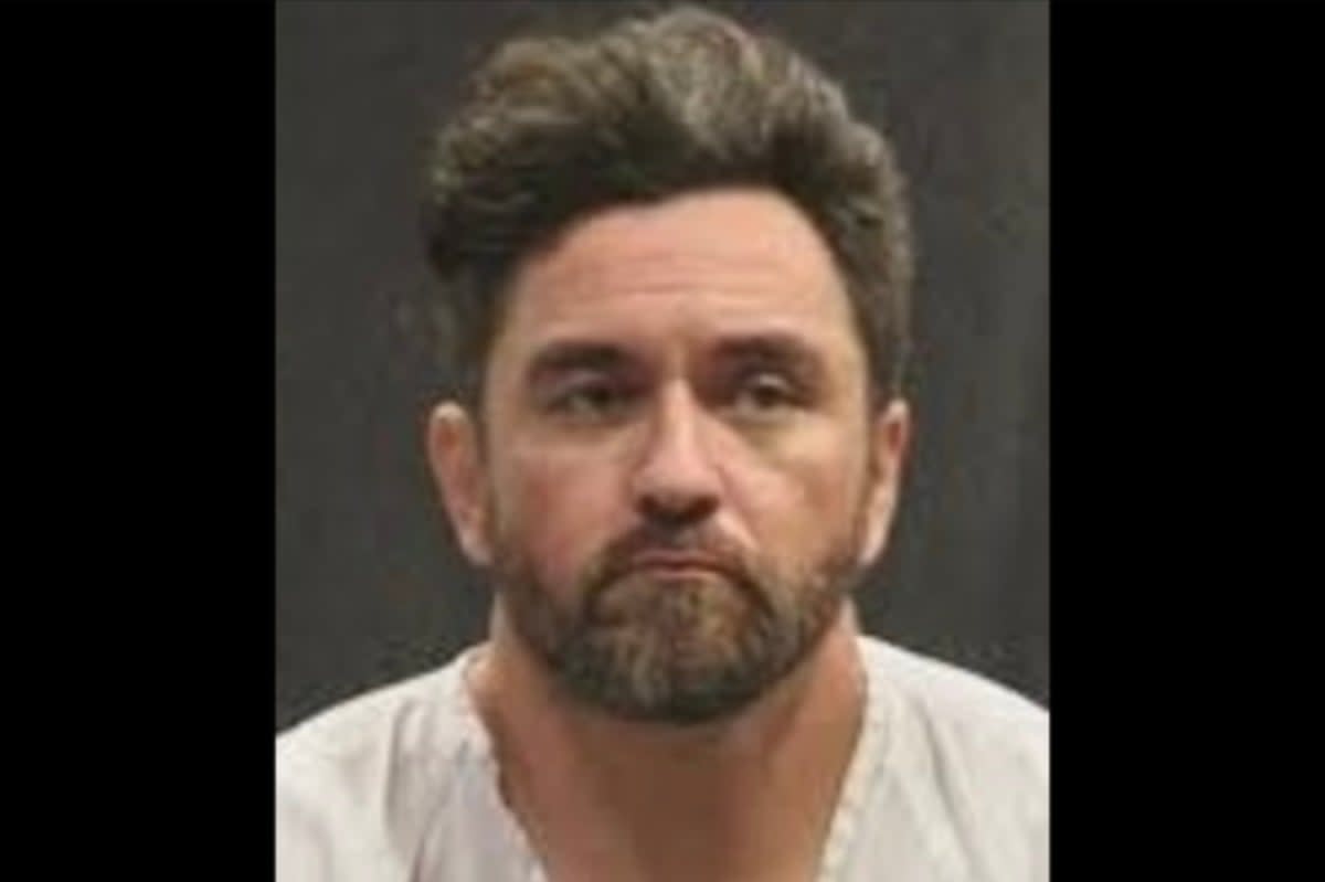 William Holloway faces a murder charge after police say a woman jumped out of his car during a chase  (Pima County Sheriff’s Department)