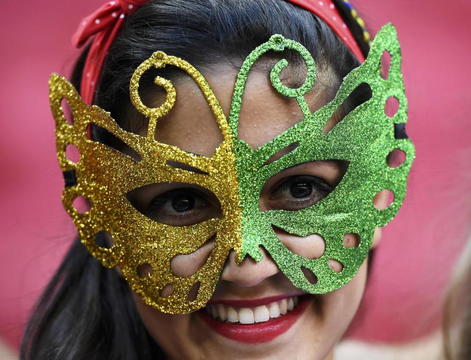 A soccer fan attends the 2014 World Cup Group G soccer match between Portugal and Ghana at the Brasilia national stadium in Brasilia June 26, 2014. REUTERS/Dylan Martinez (BRAZIL - Tags: SOCCER SPORT WORLD CUP)