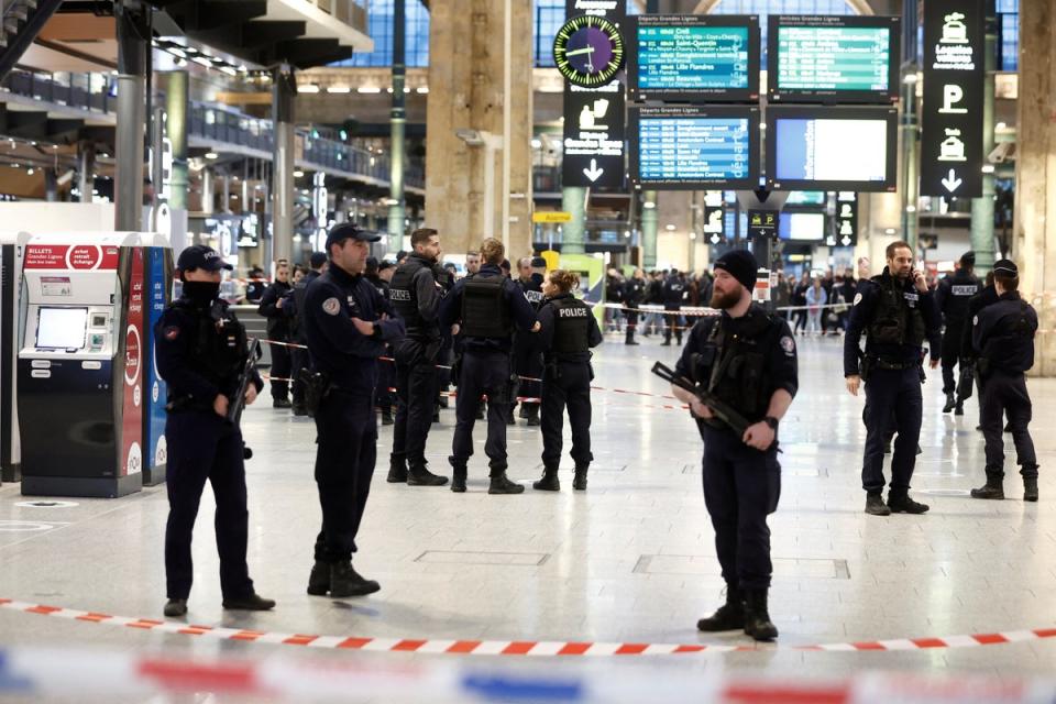 French police secure the area after a man with a knife wounded several people at the Gare du Nord train station in Paris (REUTERS)