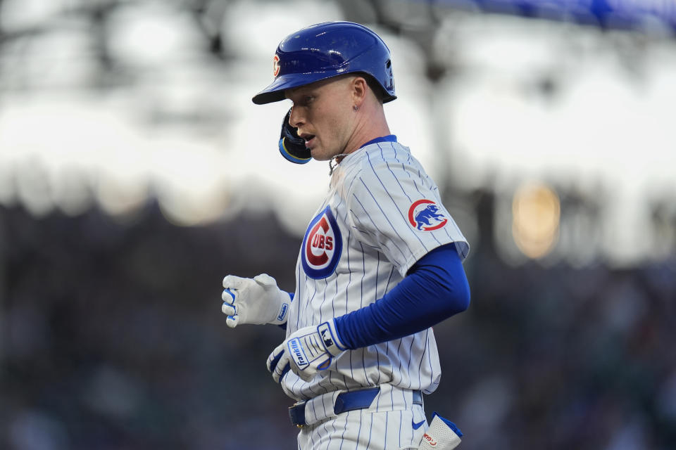 Chicago Cubs' Pete Crow-Armstrong hops back to first base after hitting a single during the third inning of the team's baseball game against the San Diego Padres, Tuesday, May 7, 2024, in Chicago. (AP Photo/Erin Hooley)