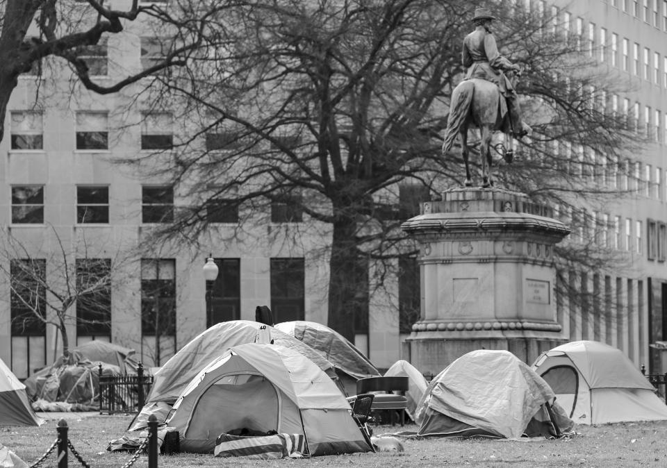 Homeless people take shelter in tents at McPherson Square in Washington D.C. 