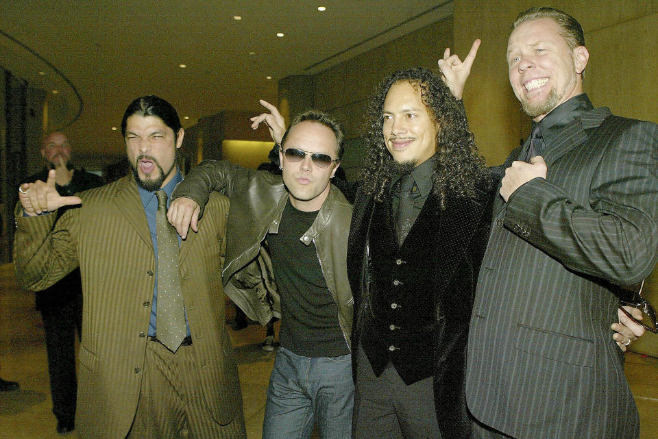 BEVERLY HILLS, CA - MAY 18:  Rock band Metallica, (L- R) Robert Trujillo, Lars Ulrich, Kirk Hammett and James Hetfield, receive the Creative Voice Award at the 21st Annual ASCAP Pop Music Awards at the Beverly Hilton Hotel on May 18, 2004 in Beverly Hills, California. (Photo by Kevin Winter/Getty Images)