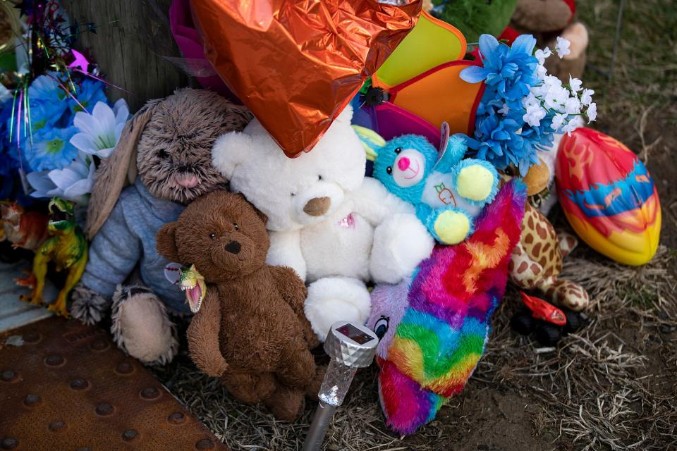 A memorial for 7-year-old Sevion Sanford grows at the corner of 21st and Yorkshire Court in Indianapolis on Sunday, March 20, 2022. Sanford was fatally hit by two vehicles at the intersection while waiting for the school bus on Friday morning, March, 18, 2022. IMPD says the crash is being investigated as a hit-and-run, as one of the vehicles fled the scene. 