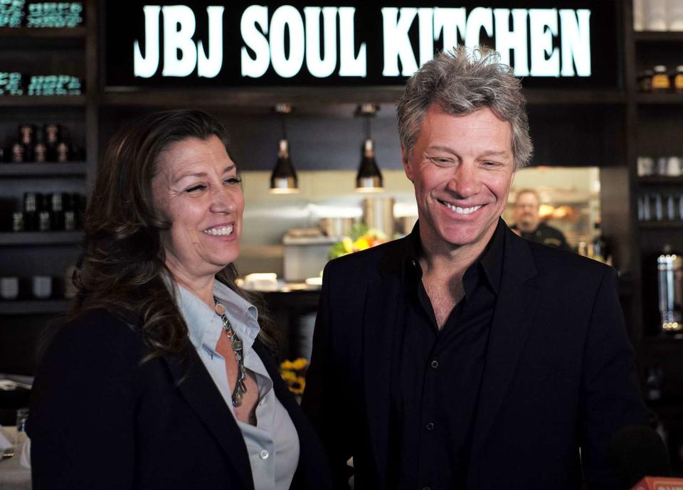 Jon Bon Jovi and his wife Dorothea smile after opening the BEAT (Bringing Everyone All Together) center in Toms River, New Jersey, on May 10, 2016