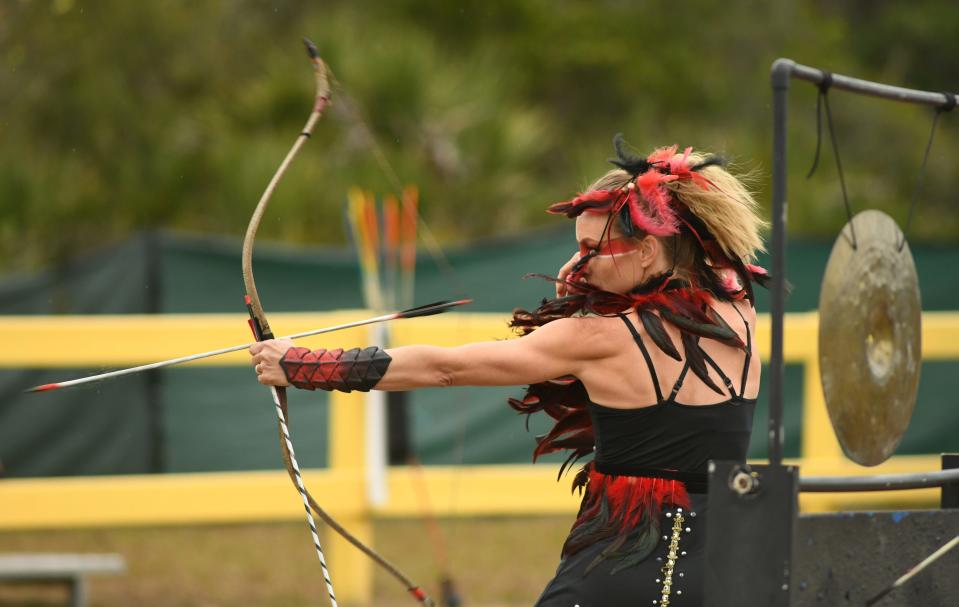 Lady Celisse lets loose an arrow at the 2024 Brevard Renaissance Fair in Florida. North Central Mass. will be hosting two Renaissance fairs this spring.