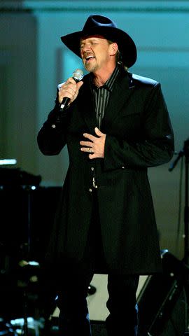 <p>Paul Hawthorne/Getty </p> Trace Adkins performing at the Opry in November 2005