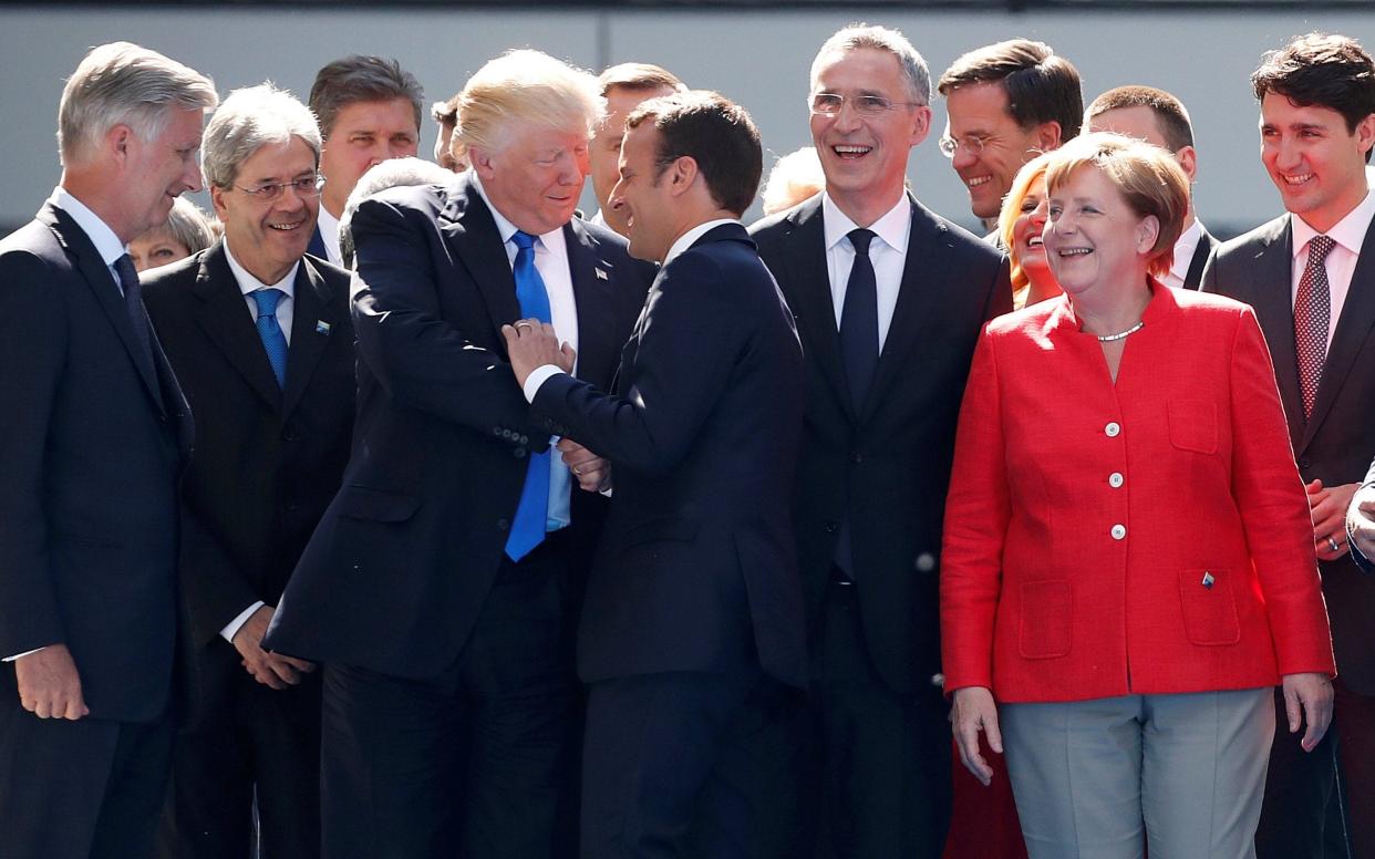 The Nato leaders before the start of the summit in Brussels - REUTERS