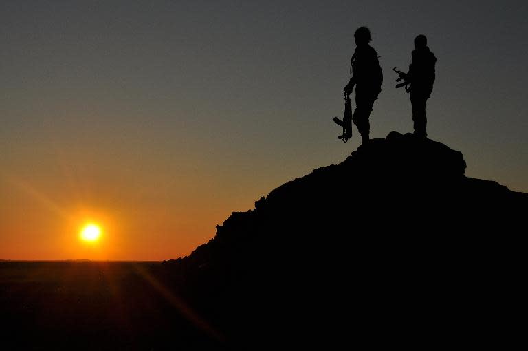 Kurdish People's Protection Unit (YPG) fighters in Tal Hamis, in Syria's Hasakeh province, on February 26, 2015