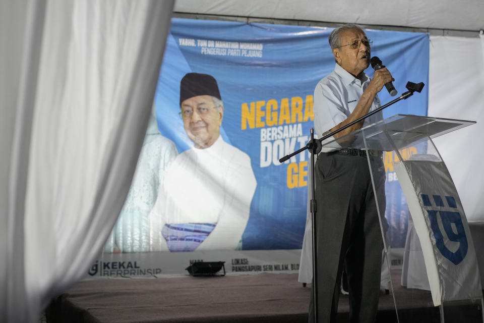 Two-time former Malaysian Prime Minister and Gerakan Tanah Air, or Homeland Movement Chairman Mahathir Mohamad speaks at a rally for his party in Kuala Lumpur, Malaysia, Tuesday, Nov. 15, 2022. At 97, Mahathir is back again in the election race as the head of a new ethnic Malay alliance that he calls a "movement of the people." He hopes his bloc could gain enough seats in Nov. 19 polls to be a powerbroker. (AP Photo/Vincent Thian)