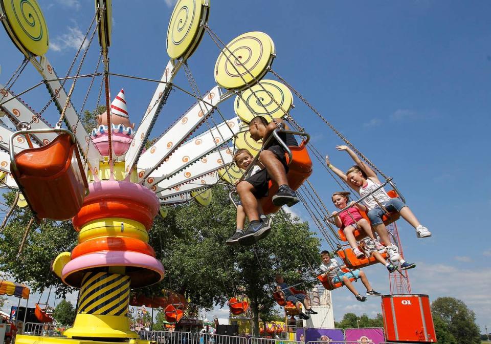 Kids on the swings at the Bluegrass Fair in 2017.