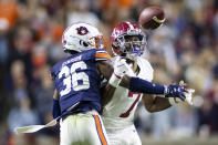 Auburn cornerback Jaylin Simpson (36) breaks up a pass to Alabama wide receiver Ja'Corey Brooks (7) during the second half of an NCAA college football game, Saturday, Nov. 27, 2021, in Auburn, Ala. (AP Photo/Vasha Hunt)