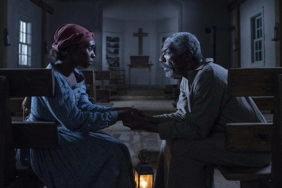 This image released by Focus Features shows Cynthia Erivo as Harriet Tubman, left, and Vondie Curtis-Hall as Reverend Green in a scene from "Harriet." (Glen Wilson/Focus Features via AP)