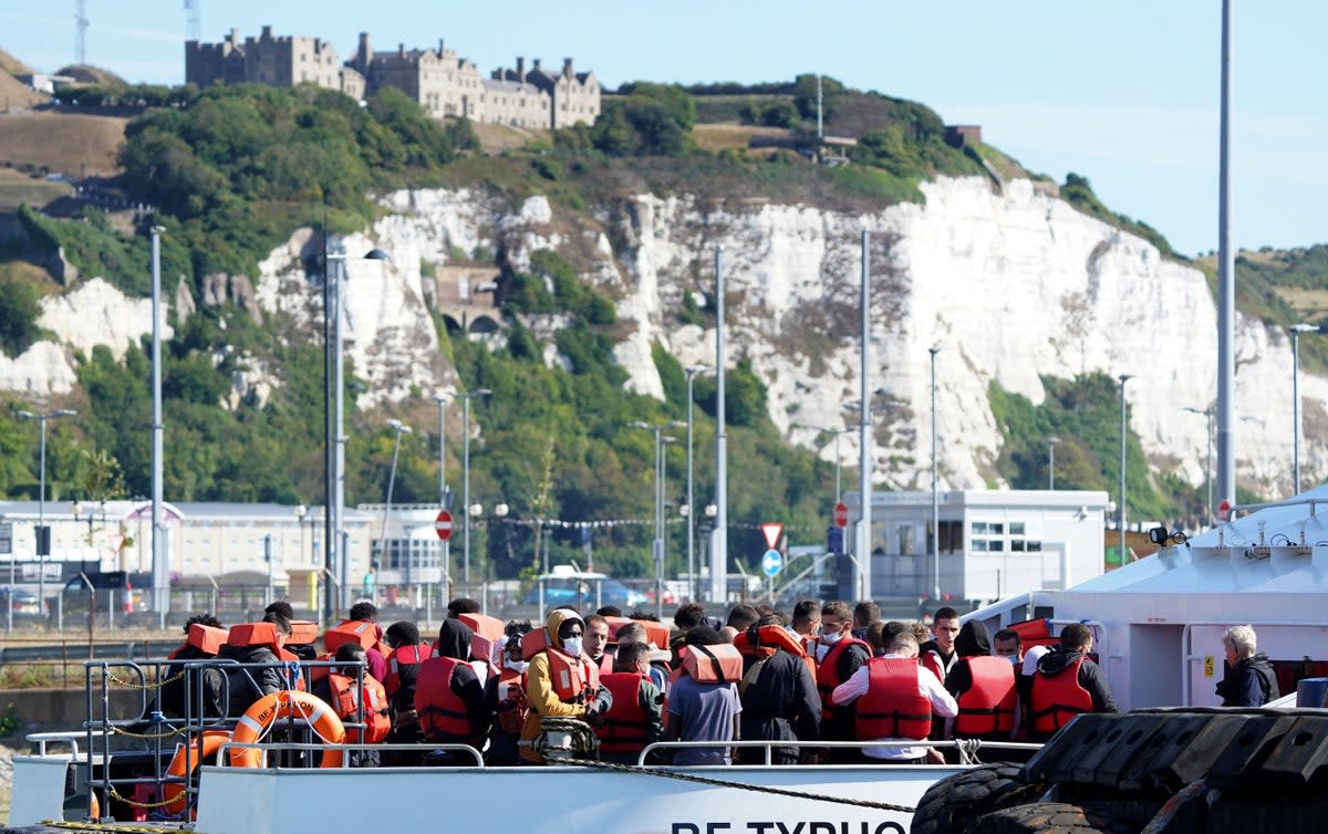 A group of people thought to be migrants are brought in to Dover, Kent, from a Border Force Vessel (Gareth Fuller/PA) (PA Wire)