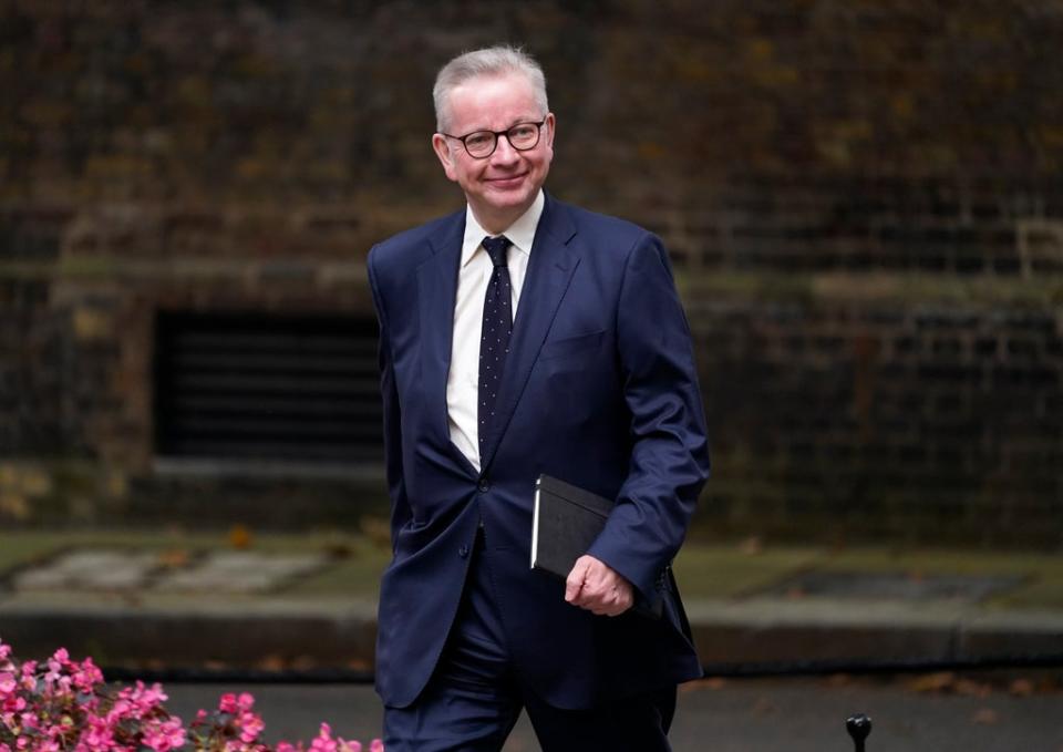 Michael Gove arriving at 10 Downing Street (AP)