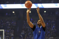 Bryce Hopkins takes a shot during the 3-point contest of Kentucky's NCAA college basketball season kickoff event, Big Blue Madness, in Lexington, Ky., Friday, Oct. 15, 2021. (AP Photo/James Crisp)