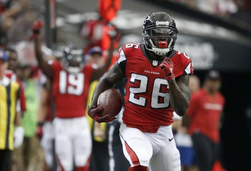 Sep 11, 2016; Atlanta, GA, USA; Atlanta Falcons running back Tevin Coleman (26) carries the ball in the third quarter of their game against the Tampa Bay Buccaneers at the Georgia Dome. The Buccaneers won 31-24. Mandatory Credit: Jason Getz-USA TODAY Sports