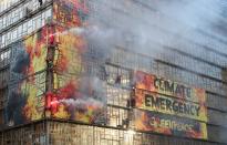 FILE PHOTO: Greenpeace protests outside the EU Council headquarters in Brussels