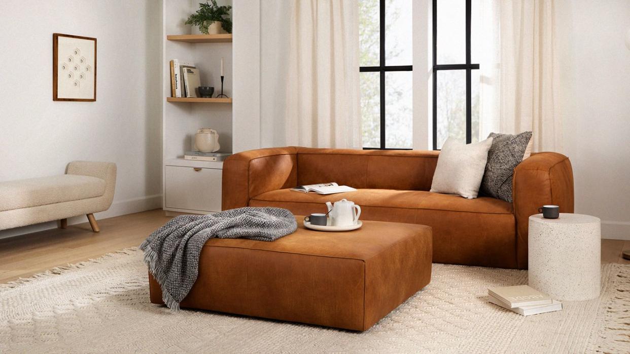 a living room with a couch and coffee table