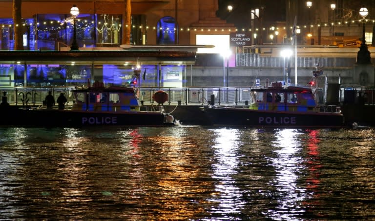 Police boats sit moored to Westminster Pier on the River Thames in London on January 19, 2017, following the discovery of a suspected World War II bomb in the river between Westminster Bridge and Waterloo Bridge