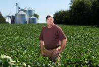Farmer Doug Zink stands in one of his soybean fields near Carrington, North Dakota