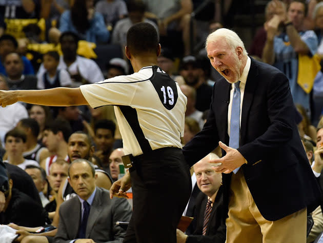 Coach Popovich makes a point about dry-rub barbecue. (Getty)