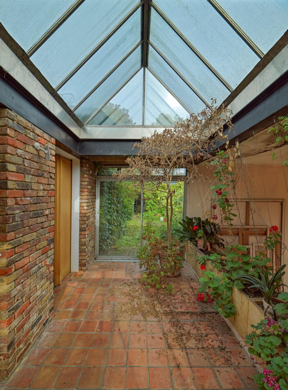 A conservatory atmosphere is created by the rooflights (Historic England Archive)