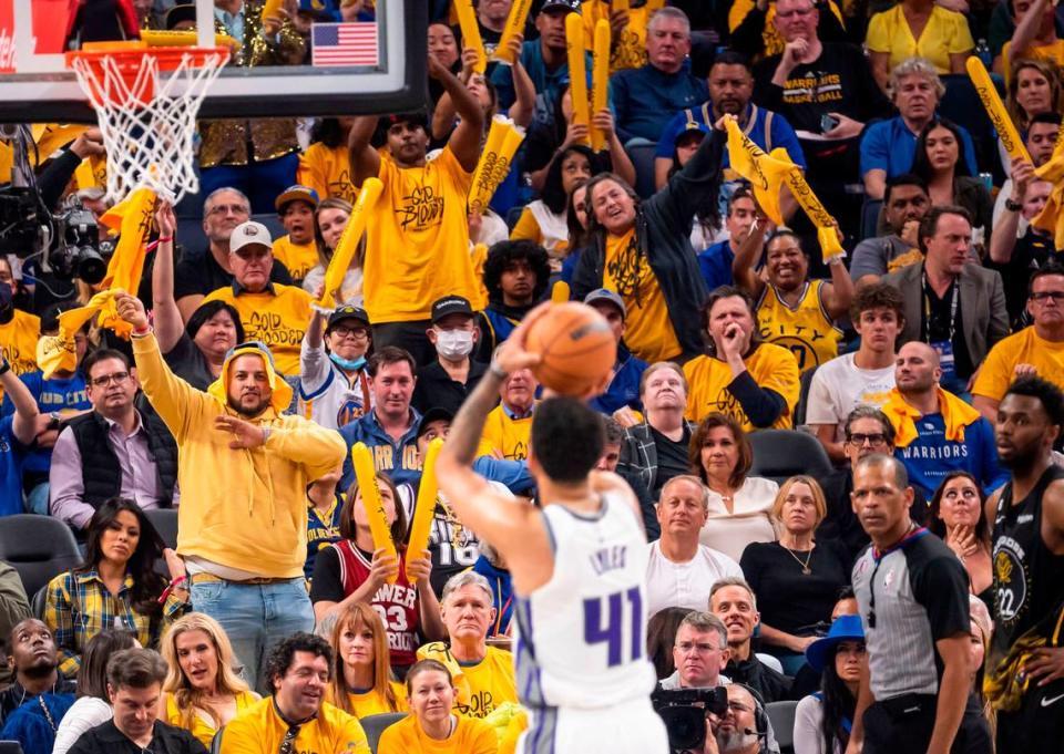 Golden State Warriors fans make noise as Sacramento Kings forward Trey Lyles (41) shoots a free throw in the second half of Game 3 of the first-round NBA playoff series at Chase Center in San Francisco on Thursday, April 20, 2023.