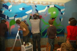 Teens paining wall...badly